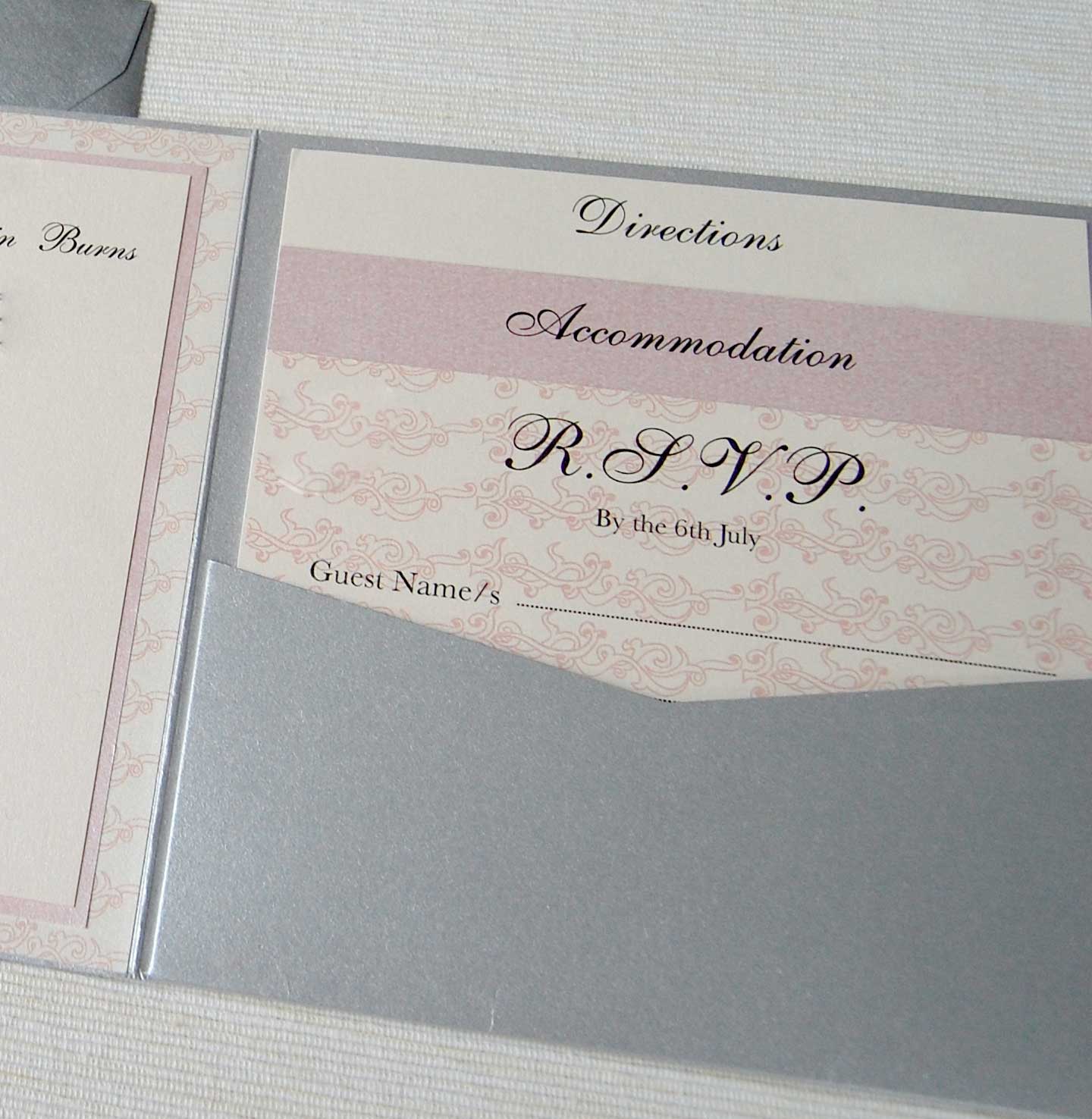 Wedding invitations in pink and silver